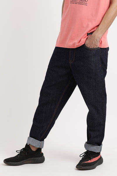Indigo blue color tapered fit unisex jeans