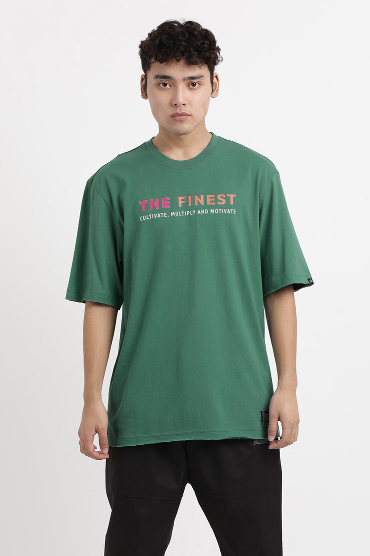 Green color oversized unisex t-shirt with front and back print