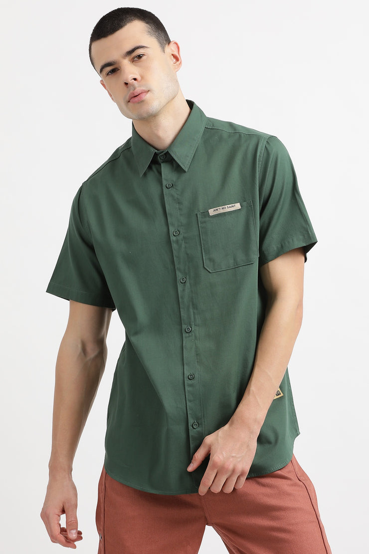 green color relaxed half shirt with back print