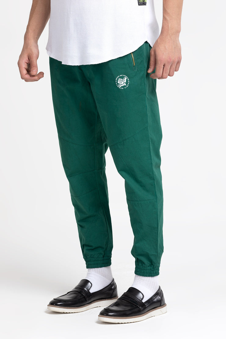 Green twill joggers track pants with side zippers