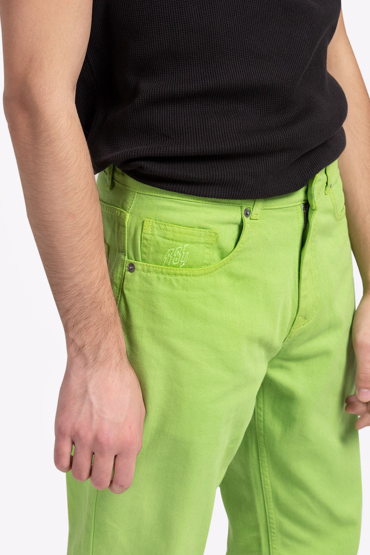 Green color over dyed denim pants