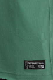 Green color oversized unisex t-shirt with front and back print