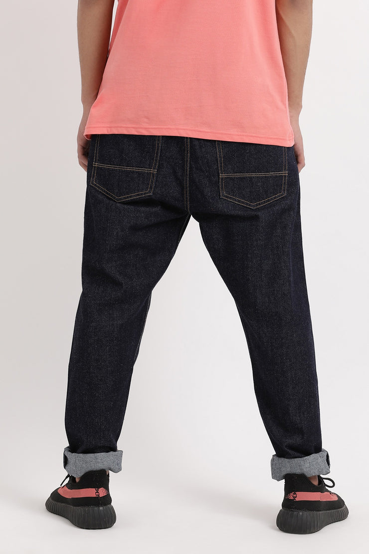 Indigo blue color tapered fit unisex jeans