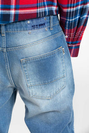 Light blue color heavy damaged denim pants for both men and women