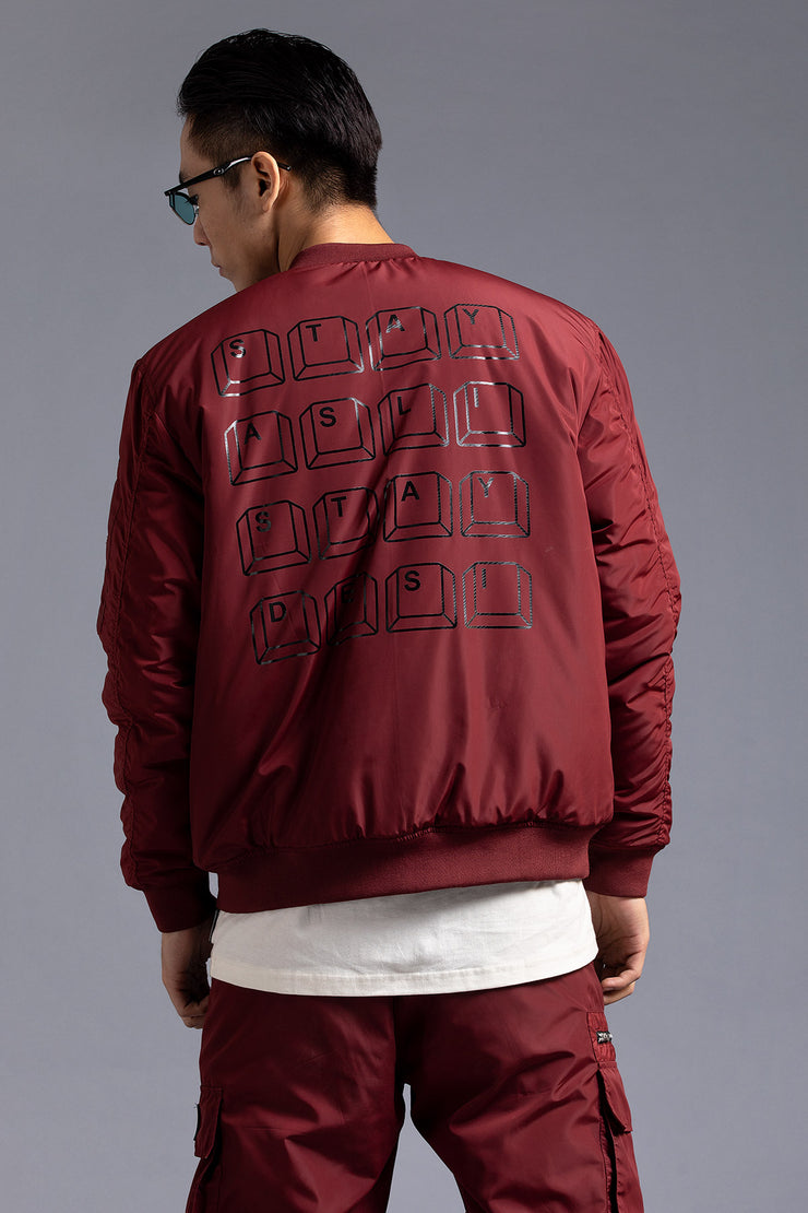 Maroon zip up jacket with back print