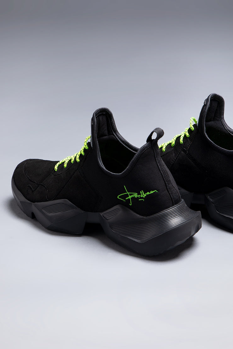 Black edgy casual shoes with neon laces